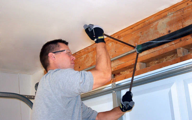 How Do You Adjust the Springs on a Garage Door