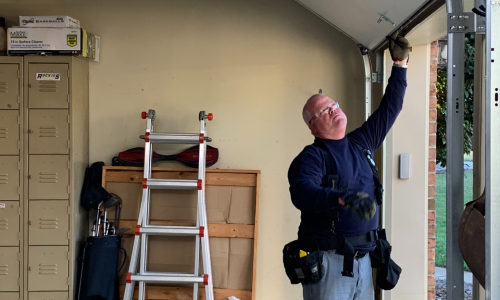 Dealer Inspecting Door